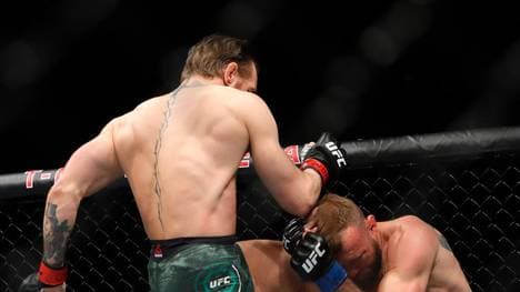 LAS VEGAS, NEVADA - JANUARY 18:  Conor McGregor lands a knee to the face of Donald Cerrone in the first round in a welterweight bout during UFC246 at T-Mobile Arena on January 18, 2020 in Las Vegas, Nevada.  (Photo by Steve Marcus/Getty Images)