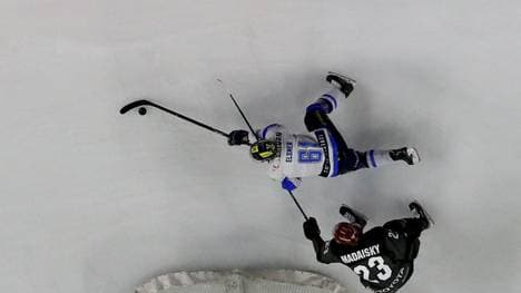 COLOGNE, GERMANY - MARCH 12: Austin Madaisky #23 of Koeln challenges David Elsner of Ingolstadt during the DEL Playoffs Quarter Final game 1 between Koelenr Haie and ERC Ingolstadt at Lanxess Arena on March 12, 2019 in Cologne, Germany. (Photo by Martin Rose/Bongarts/Getty Images)