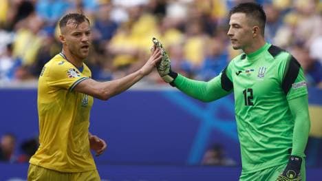 Anatolij Trubin (r.) will Taten sprechen lassen