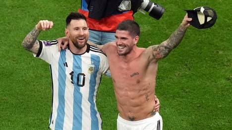 Lionel Messi (l.) an der Seite von Rodrigo de Paul