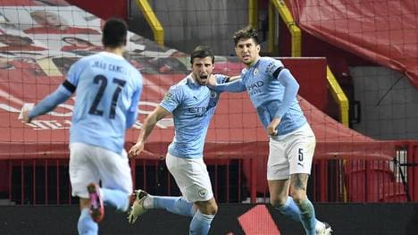 Die Abwehr von ManCity um dessen Chef Ruben Dias (m.) präsentiert sich titelreif
