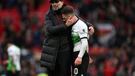 Jürgen Klopp (l.) war nach dem Spiel als Tröster gefragt