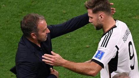 Trainer Hansi Flick (l.) und Stürmer Niclas Füllkrug