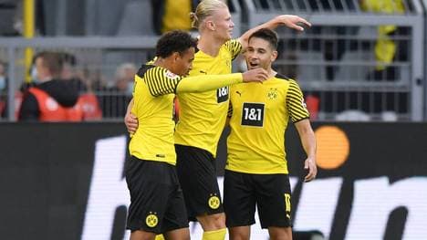 Raphael Guerreiro, Erling Haaland und  Donyell Malen stehen beim BVB gegen Frankfurt in der Startelf