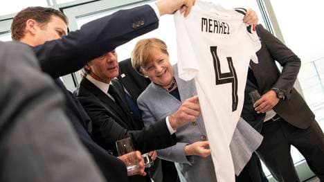 German Chancellor Merkel Receives Football Delegation