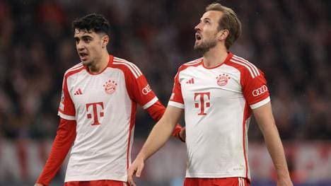 Die Bayern-Stars Aleksander Pavlovic (l.) und Harry Kane mussten verletzungsbedingt ausgewechselt werden