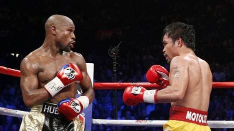 Floyd Mayweather (links) beendete seine Box-Karriere mit einem Sieg gegen Manny Pacquiao 