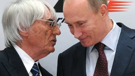 Russian Prime Minister Vladimir Putin (R