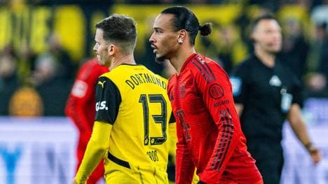 Leroy Sané (r.) leistete sich einen Ellenbogencheck gegen Pascal Groß (l.)