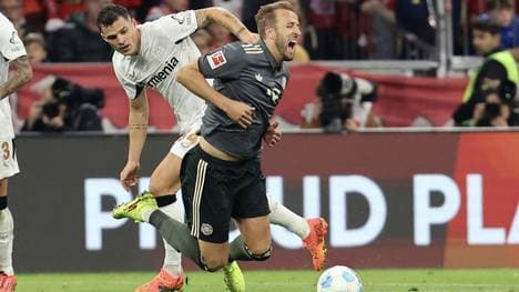 Harry Kane im Duell mit Granit Xhaka 